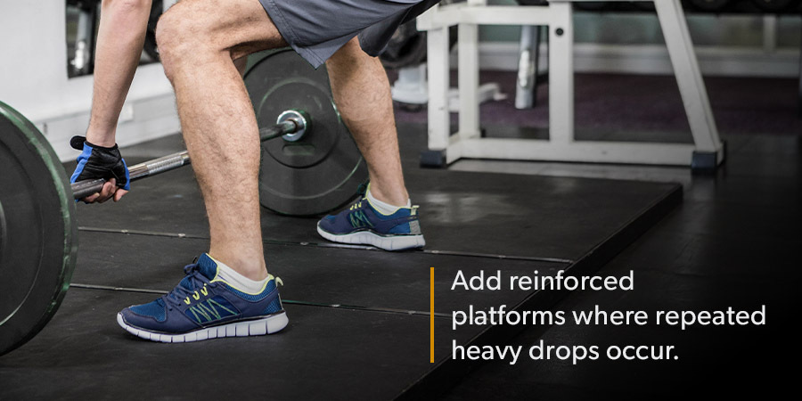 Add reinforced platforms where repeated heavy drops occur